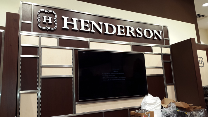 БИЗНЕС ДЕКОР. Вывеска HENDERSON производства БИЗНЕС ДЕКОР в ТЦ Еропйский (Москва) - производство и монтаж БИЗНЕС ДЕКОР. Гарантия 24 месяца