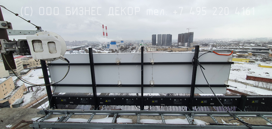 Бизнес Декор. Крышная рекламная установка на медиафасад MAER (Москва, Волгоградский пр.)